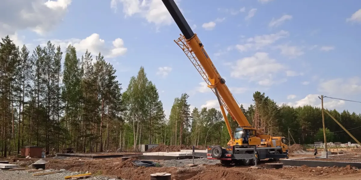 Выбор грузоподъемности автокрана при строительстве